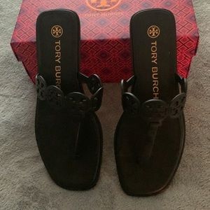 Tory Burch black sandals.